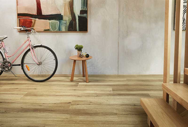Luxury Vinyl Plank Natural Oak Flooring in Nevada Plain With Staircase and Table