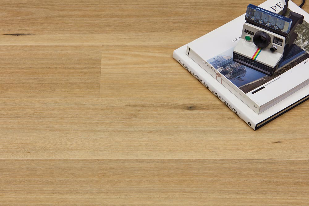 Polaroid Camera above Heartridge Australian Timber Flooring in Blackbutt Colour