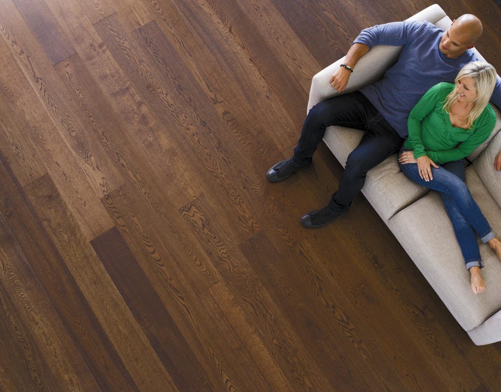Couple with Engineered Timber Flooring Vintage Oak in Hedgerow Colour in Loungeroom