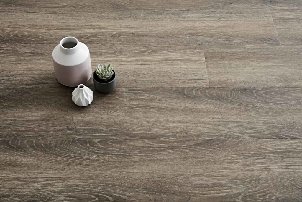 Luxury Vinyl Plank Flooring in Windspray Colour with Pot Plant and Jug