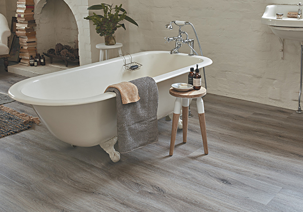 Bath and Sink with Luxury Vinyl Plank Smoked Oak Flooring